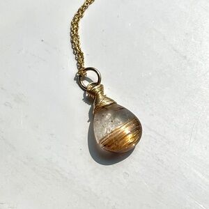 Delicate golden rutilated rutile quartz pendant with chain
